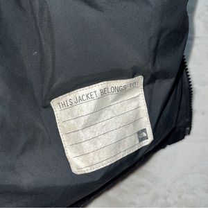 Boys size large (12/14) the north face black puffer jacket. No zipper.